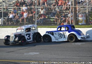 Mike Van Houten and Ray Fitzgerald collide coming out of Turn 4.